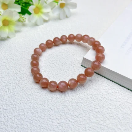 alt="orange crystal bracelet"