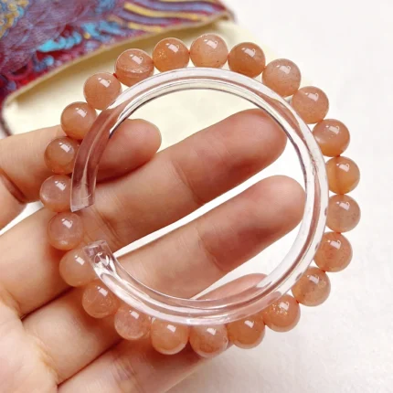 alt="orange crystal bracelet"