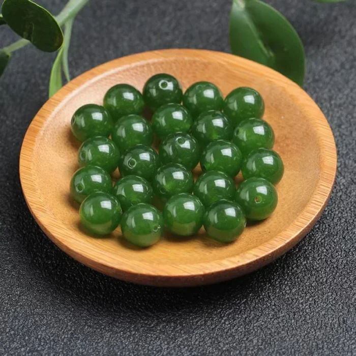 alt="nature hetian dark green jade beads"