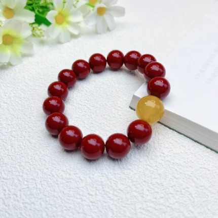 alt="big cinnabar bracelet and yellow carnelian"