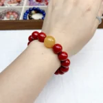 alt="big cinnabar bracelet and yellow carnelian"