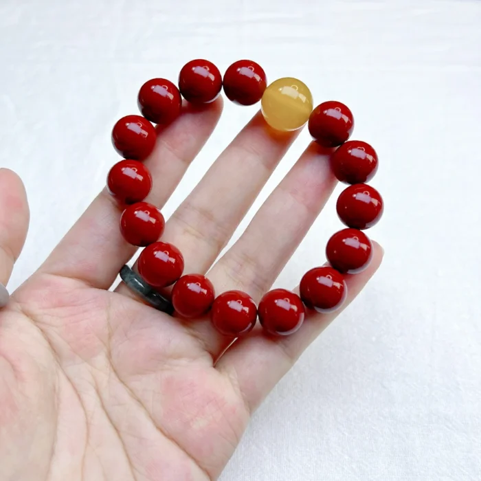 alt="big cinnabar bracelet and yellow carnelian picture"