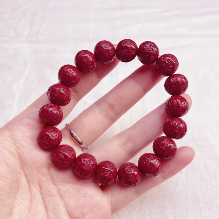 alt="big fuzi cinnabar bracelet"