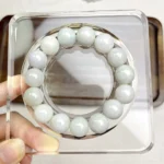 alt=“big jade bracelet”