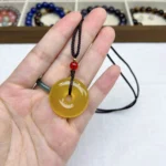 alt="yellow chalcedony necklace 30mm view"