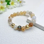 alt="cloisonne yellow crystal bracelet"