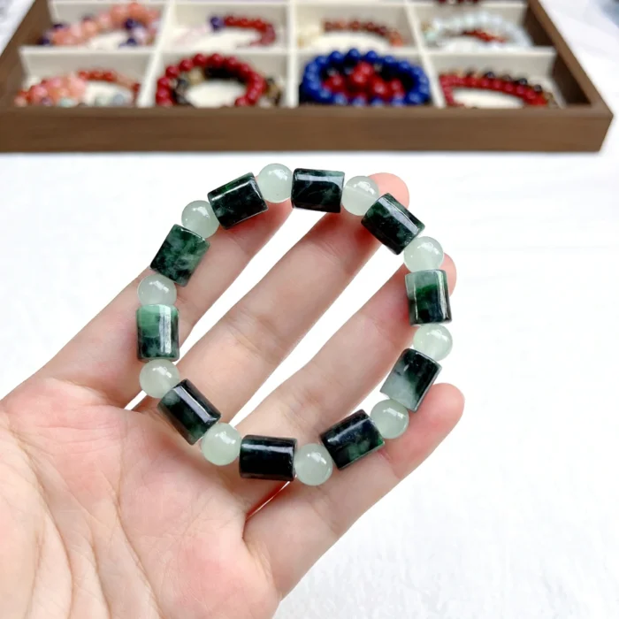 alt="cylinder shaped jade bracelet"