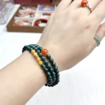 alt="deep green multi loop jade bracelet photo"