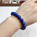 alt="lapis lazuli bracelet and gemstone"