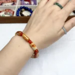 alt="long jade bracelet wear"