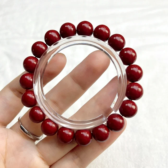 alt="middle cinnabar bracelet"