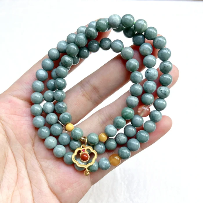 alt=”multi loop deep green jade bracelet beautiful“