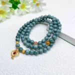 alt="multi loop deep green jade bracelet effect"