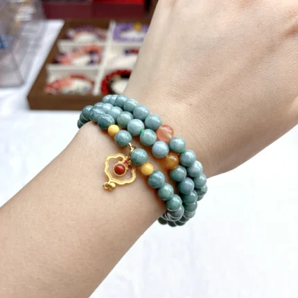 alt="multi loop deep green jade bracelet effect"