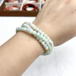 alt="multi loop jade bracelet"