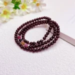 alt="multi loop pomegranate rose bracelet effect"