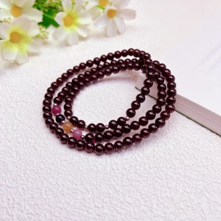 alt="multi loop pomegranate rose bracelet effect"