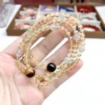 alt="multi loop yellow crystal bracelet"