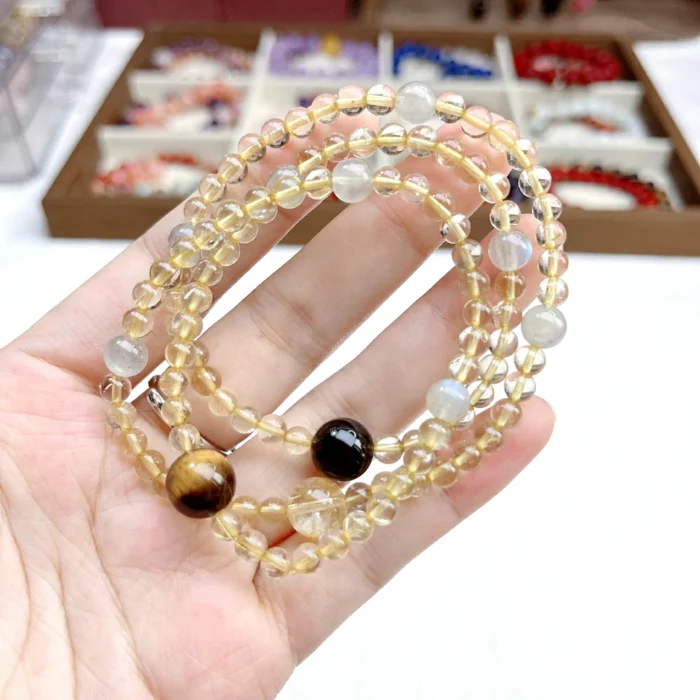 alt="multi loop yellow crystal bracelet"