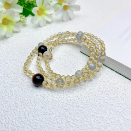 alt="multi loop yellow crystal bracelet effect"