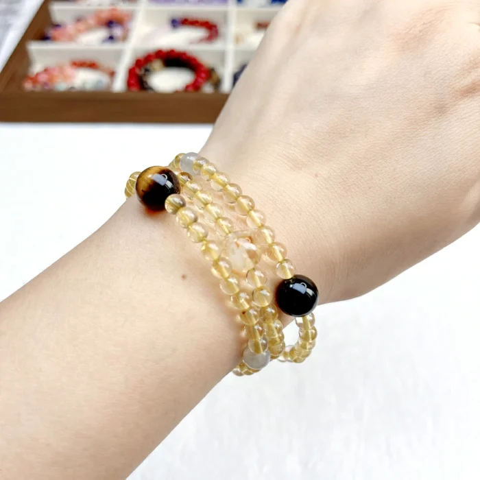 alt="multi loop yellow crystal bracelet front"