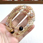 alt="multi loop yellow crystal bracelet front"