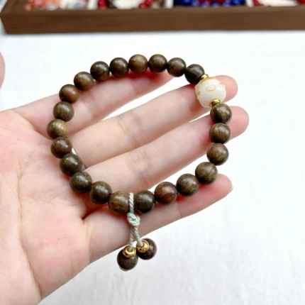 alt="nature nan wood bracelet"