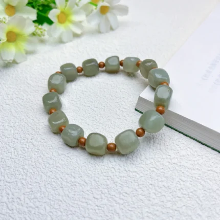 alt="nature pure green jade bracelet"