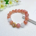 alt="orange crystal bracelet front"