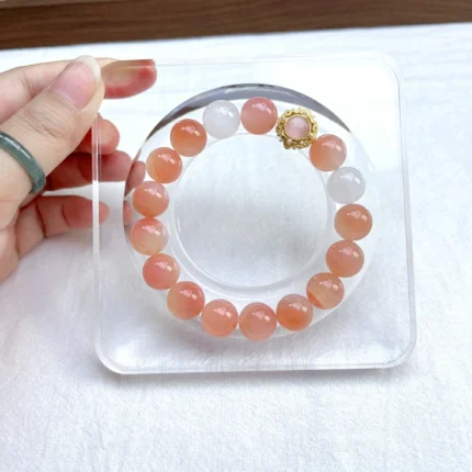 alt=“orange crystal bracelet front”