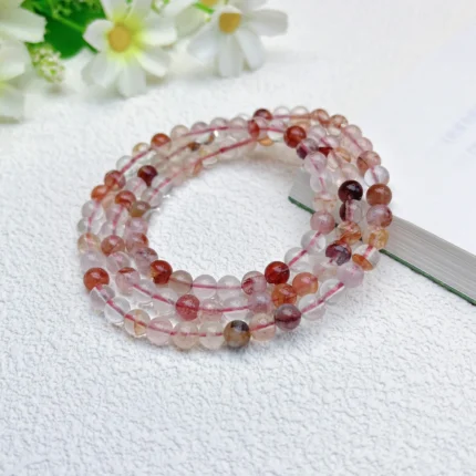 alt="orange multi loop crystal bracelet effect"