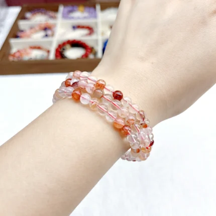 alt="orange multi loop crystal bracelet effect"