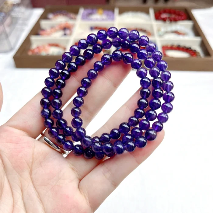 alt="purple multi loop crystal bracelet photo"