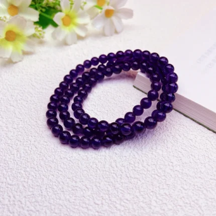 alt="purple multi loop crystal bracelet view"