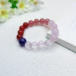 alt="red and purple carnelian crystal bracelet"