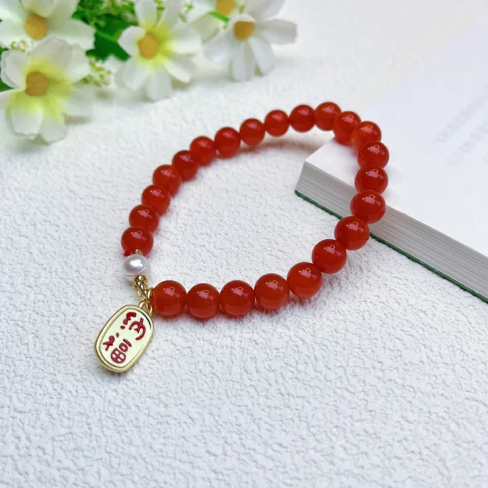 alt="red carnlian bracelet on hand effect"