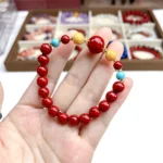 alt="red cennabar bracelet view"