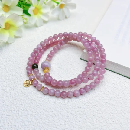 alt="rose quarts crystal multi loop bracelet effect"