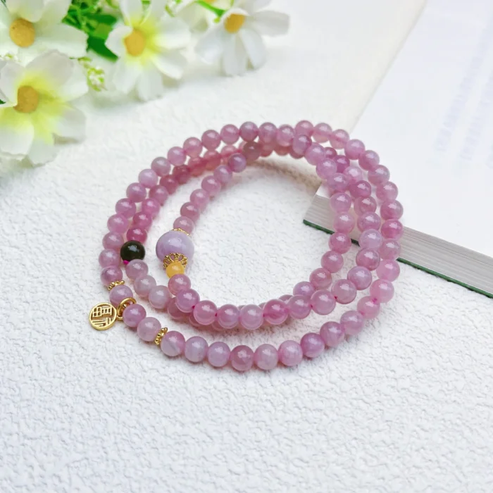 alt="rose quarts crystal multi loop bracelet effect"