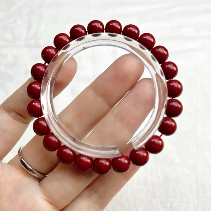 alt="small cinnabar bracelet"