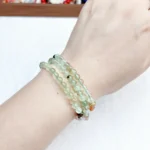 alt="soft green loop crystal bracelet effect"