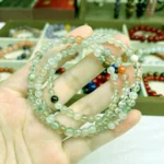 alt="soft green loop crystal bracelet photo"