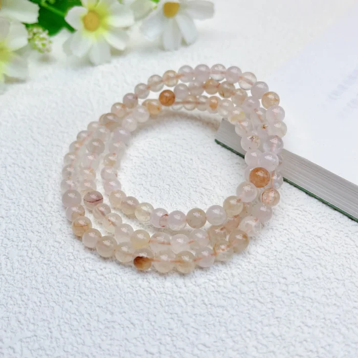 alt="soft orange multi loop crystal bracelet effect"