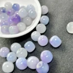 alt="nature light purple jade beads"