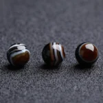 alt="black agate gemstone beads"