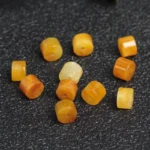 alt="nature yellow green jateite beads"