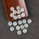 alt="nature jade coin pendant"